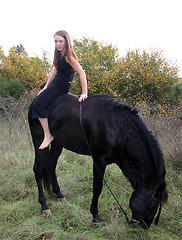 Image showing young woman and horse