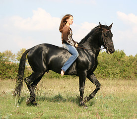 Image showing young woman and horse