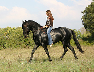 Image showing young woman and horse