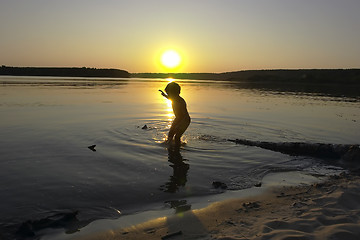 Image showing boy and sunset