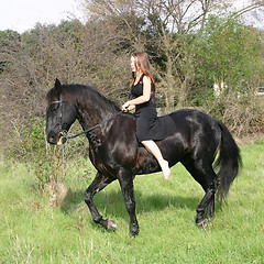 Image showing young woman and horse