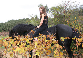 Image showing young woman and horse