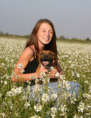 Image showing staffordshire bull terrier and girl