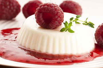 Image showing Vanilla panna cotta with berry sauce