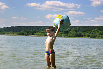 Image showing our world in the child's hand