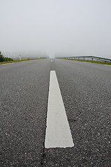 Image showing Background of asphalt road mark early morning fog 