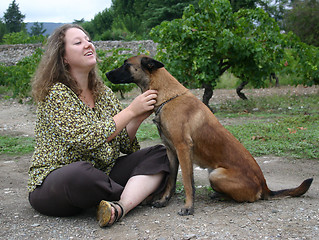 Image showing malinois and girl