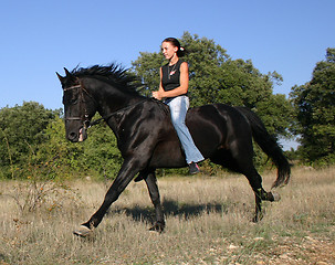 Image showing young woman and horse