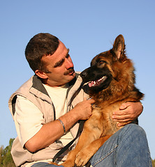 Image showing german shepherd and man