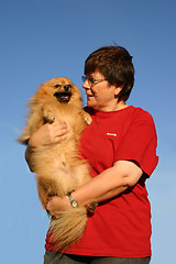 Image showing pomeranian and woman