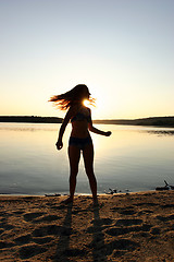 Image showing girl and sunset