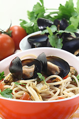 Image showing Spaghetti with mussels and tomatoes