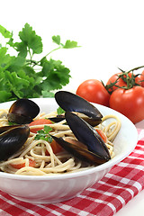 Image showing cooked Spaghetti with mussels and parsley