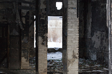 Image showing the remains of a ruined house in a terrible form of