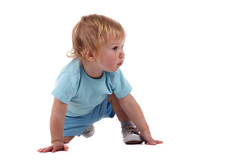 Image showing A little boy on all fours