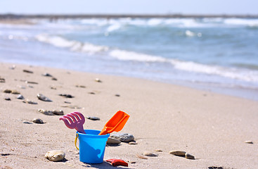 Image showing Plastic bucket on the beach