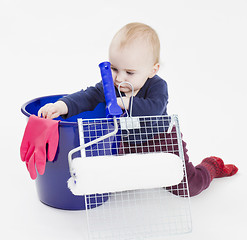 Image showing young child with painters equipment