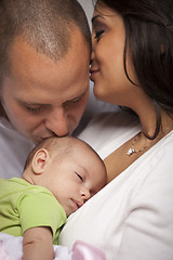 Image showing Mixed Race Young Family with Newborn Baby