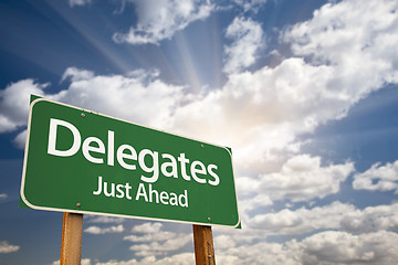 Image showing Delegates Green Road Sign and Clouds