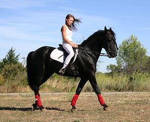 Image showing young woman and horse