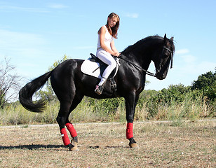 Image showing young woman and horse