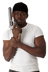 Image showing Young thug with a gun