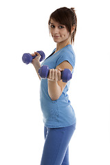 Image showing Beautiful girl with dumbbells