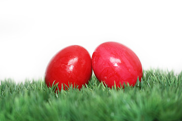 Image showing Two red eggs