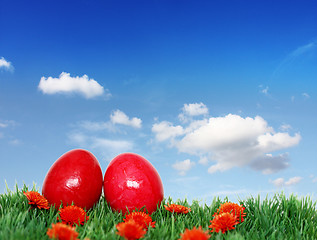 Image showing Two beautiful red eggs