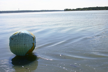 Image showing globe on the water