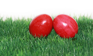Image showing Red Easter eggs in the focus