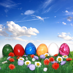 Image showing Easter eggs in grass