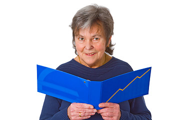 Image showing Female senior looking  at statement of account