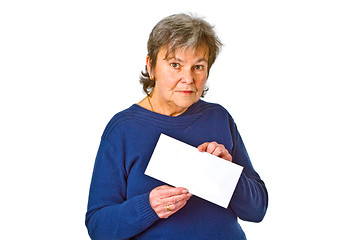 Image showing Female senior holding white envelope
