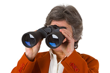 Image showing Female senior business woman with binoculars