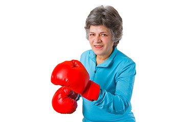 Image showing Female senior with boxing gloves