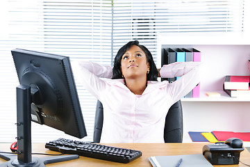 Image showing Black businesswoman resting at desk