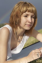 Image showing Attractive girl and rainbow