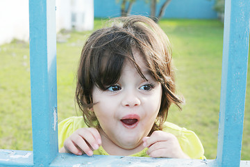 Image showing happy smiling little girl excited