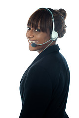 Image showing Portrait of executive female in headsets