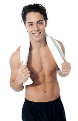 Image showing Handsome muscular man with the towel