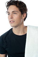 Image showing Young handsome guy with towel, closeup shot