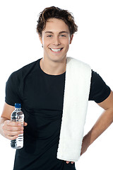 Image showing Handsome muscular man with towel