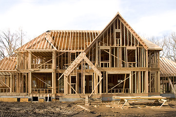 Image showing McMansion type house under construction in framing phase