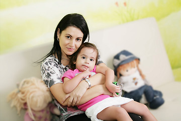 Image showing Mother and daughter in the waiting room at doctors office.