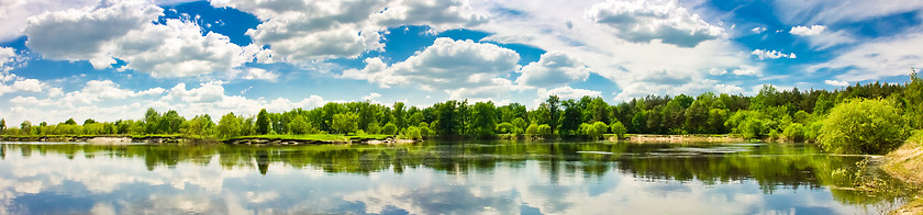 Image showing Clouds reflection on lake.