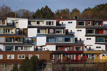 Image showing new modern architecture at frozen riverside in winter