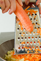 Image showing chef grating carrot