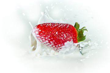 Image showing strawberry splashing into milk