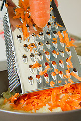 Image showing chef grating carrot